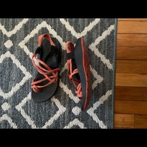 Women’s orange chacos size 9.